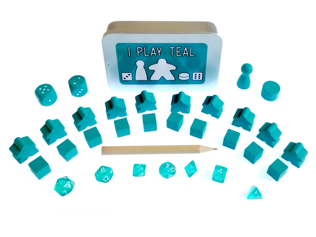 The Ultimate Board Game Survival Kit - A small tin with board game components in teal, 10 x meeples, 10 x cubes, 2 x D6 dice, 1 x pawn, 1 x cylinder, 1 x pencil, 7 piece mini dice set